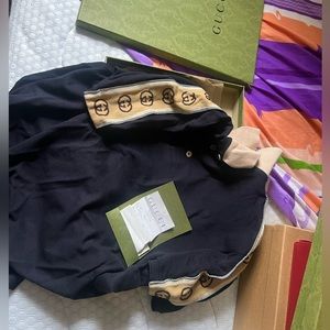 GUCCI POLO WITH INTERLOCKING G STRIPE